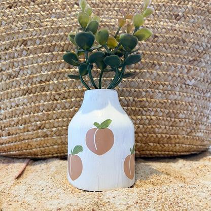 Faux Plants in Peach Vase